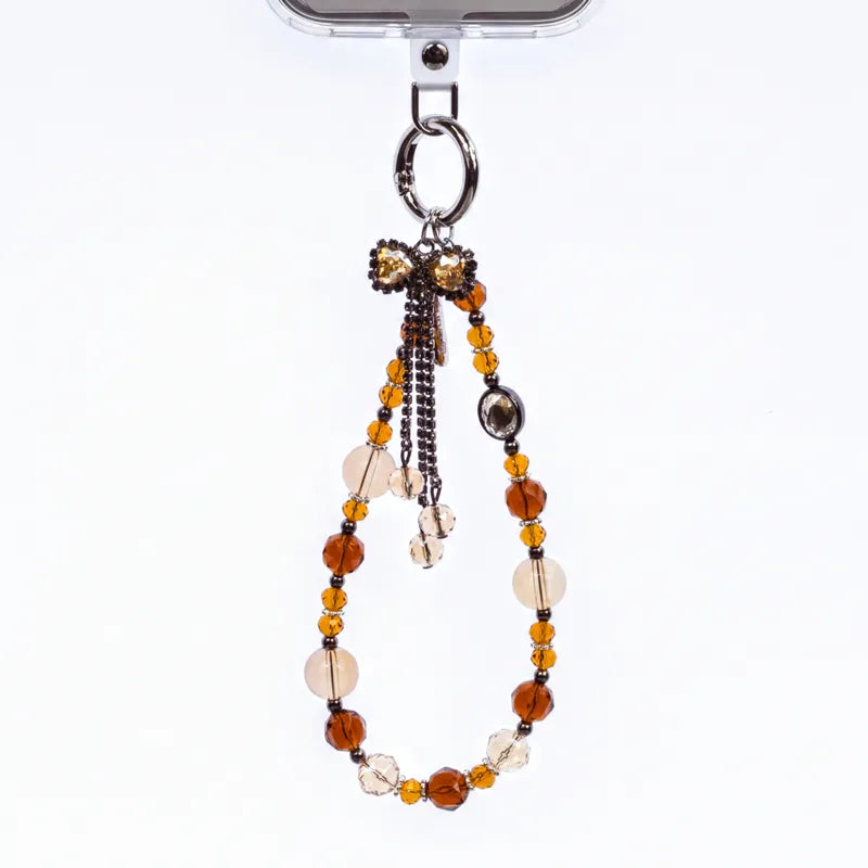 Crong Phone Charm – telefono pakabukas su dirželiu (Gold Bow)