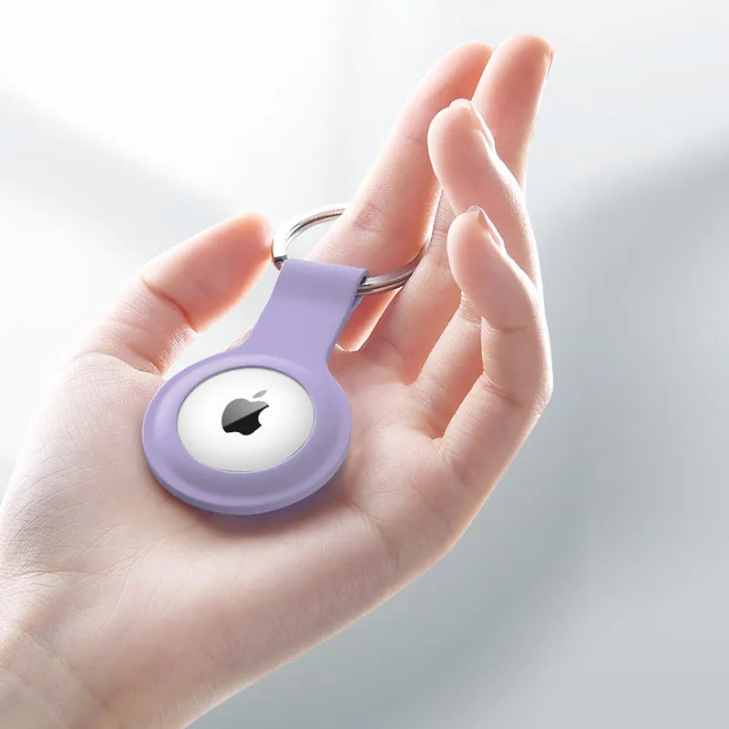 Crong silikoninis dėklas su raktų žiedu – apsauginis pakabukas, skirtas Apple AirTag 1/2 (violetinis)
