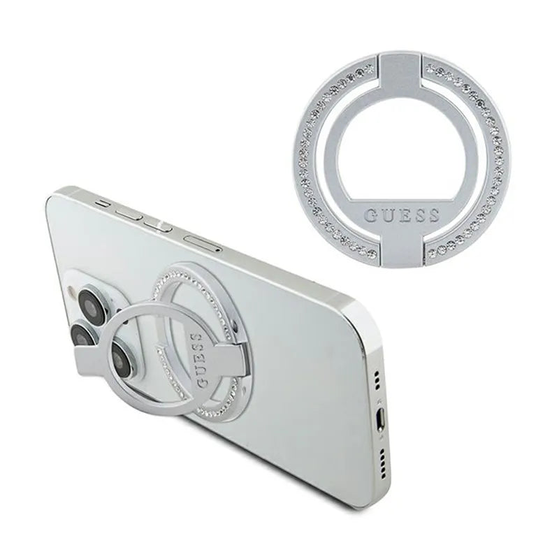 Guess MagSafe Ring Stand Rhinestone – magnetinis telefono žiedas-laikiklis su stovo funkcija (sidabrinis)