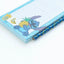 Disney Stitch – Magnetinė užrašų knygelė / pirkinių sąrašas šaldytuvui + pieštukas iš „Tropical“ kolekcijos (10 x 21 cm)