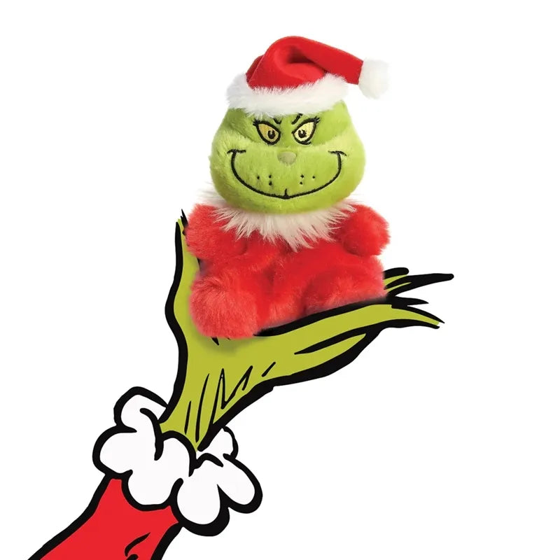 Grinch – Pliušinis žaislas / sėdintis Grinch su Kalėdų Senelio kostiumu 13 cm iš Palm Pals kolekcijos, ekologiškas